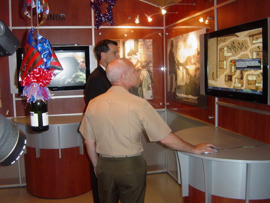 Click to view full size image
 ============== 
Close Combat Marines Kiosk at the Pentagon, Sept 2005
Martin Bushika showing Gen Magnus (Assistant Commandant of the Marine Corps) the TDS.
Keywords: marines pentagon