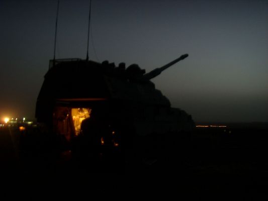 Click to view full size image
 ============== 
Pzh on firing location
This particular photo is taken a few minutes after firing 30 Illumination rounds for American forces
