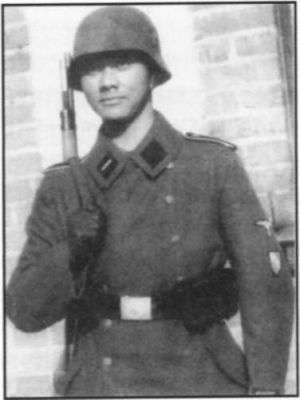 Click to view full size image
 ============== 
An Indonesian volunteer in the Dutch SS (Legion Nederland)

