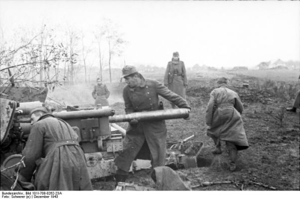 Click to view full size image
 ============== 
Russia-South (Ukraine), loading a 8.8-cm PaK 43.

Source: German Federal Archive
