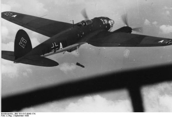 Click to view full size image
 ============== 
East Prussia, Poland campaign.- Heinkel He 111 (ID V4 + AU) of combat squadron 1 (KG 1) in flight, bombing; Lw 1 Poland.

Source: German Federal Archive
