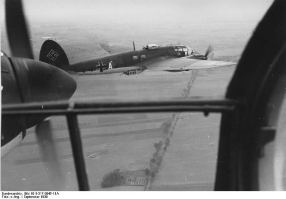 Click to view full size image
 ============== 
East Prussia, Poland campaign.- Bomber Heinkel He 111 (ID V4 + AU) of combat squadron 1 (KG 1) in flight.

Source: German Federal Archive
