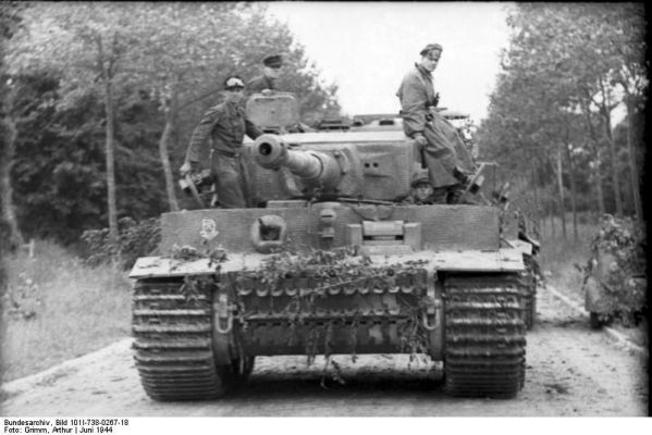 Click to view full size image
 ============== 
German Tiger I heavy tank at Villers-Bocage, France, Jun 1944.

Source: German Federal Archive
