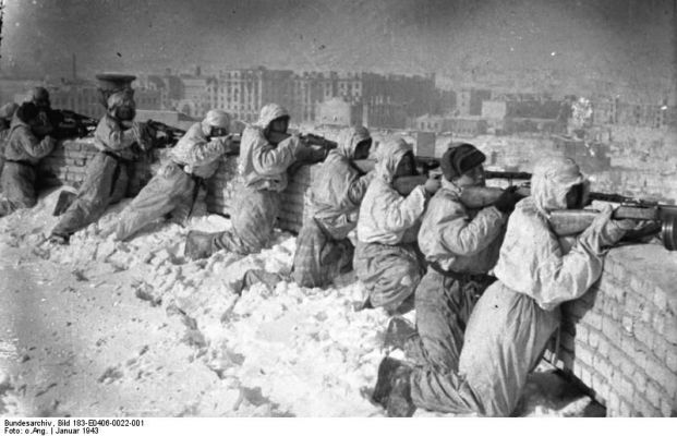 Click to view full size image
 ============== 
Russian soldiers firing from a rooftop in Stalingrad, Russia, 2 Feb 1943.

Source: German Federal Archive
