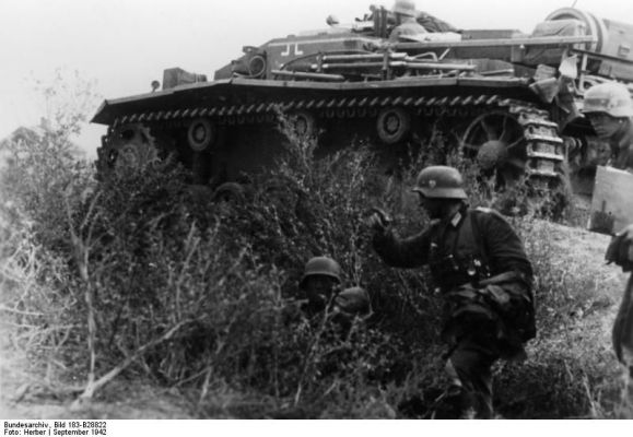 Click to view full size image
 ============== 
German troops and supporting StuG III assault gun near Stalingrad, Russia, Sep 1942.

Source: German Federal Archive
