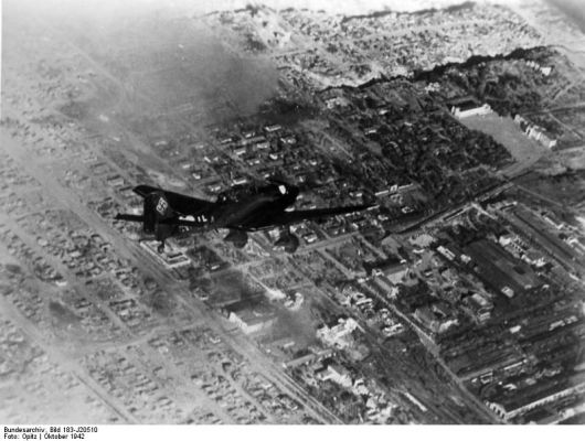 Click to view full size image
 ============== 
Ju 87 Stuka dive bomber over Stalingrad, Russia, Oct 1942, photo 1 of 3.

Source: German Federal Archives
