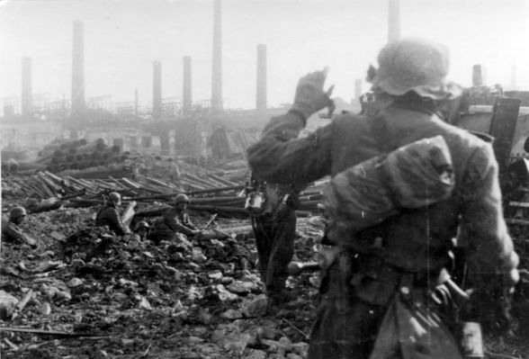 Click to view full size image
 ============== 
Soviet Union, battle around Stalingrad. - German infantrymen in foxholes on the area of a destroyed industrial plant, late autumn 1942.

Source: German Federal Archive

